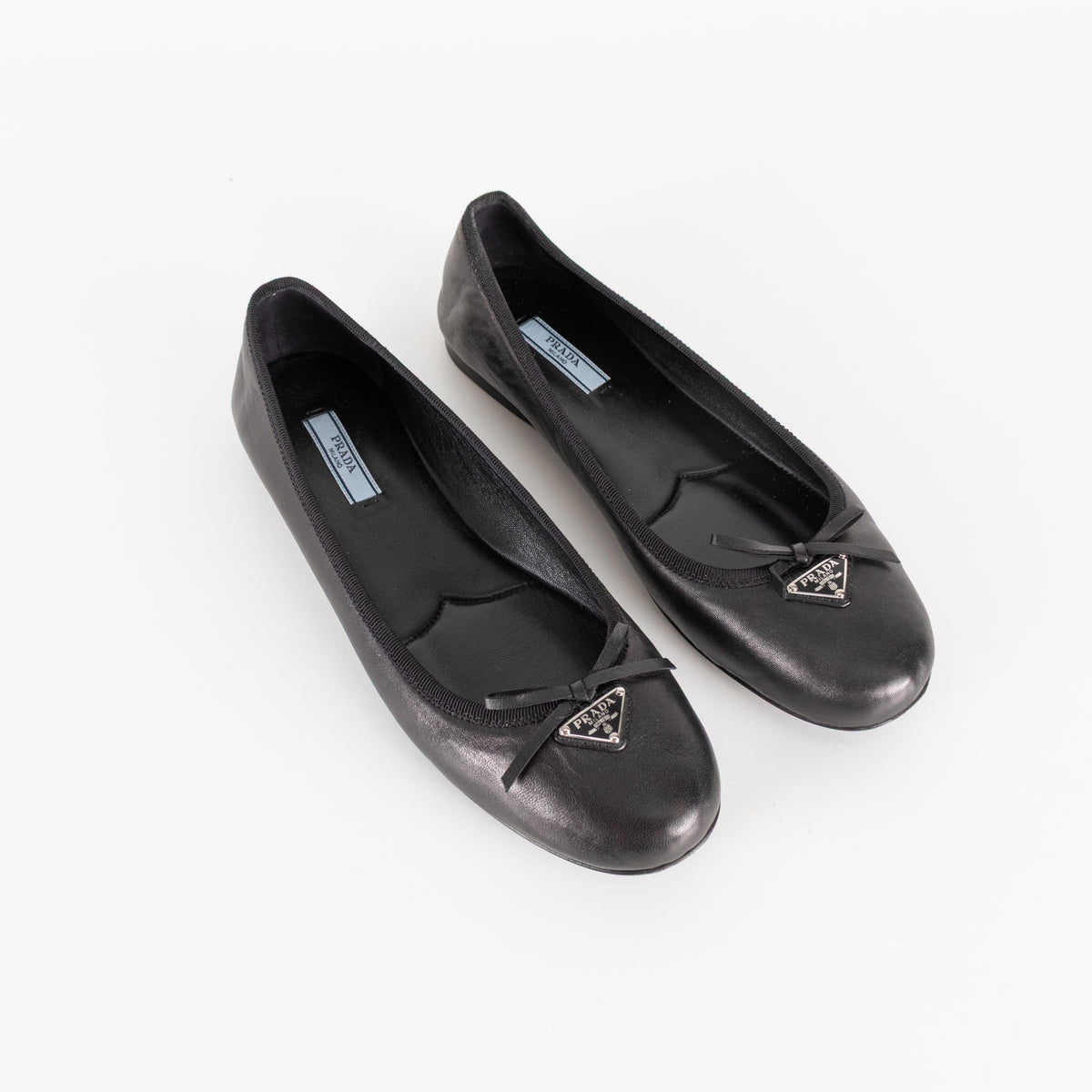 Prada Black Leather Ballet Flats With Bow And Logo Plaque