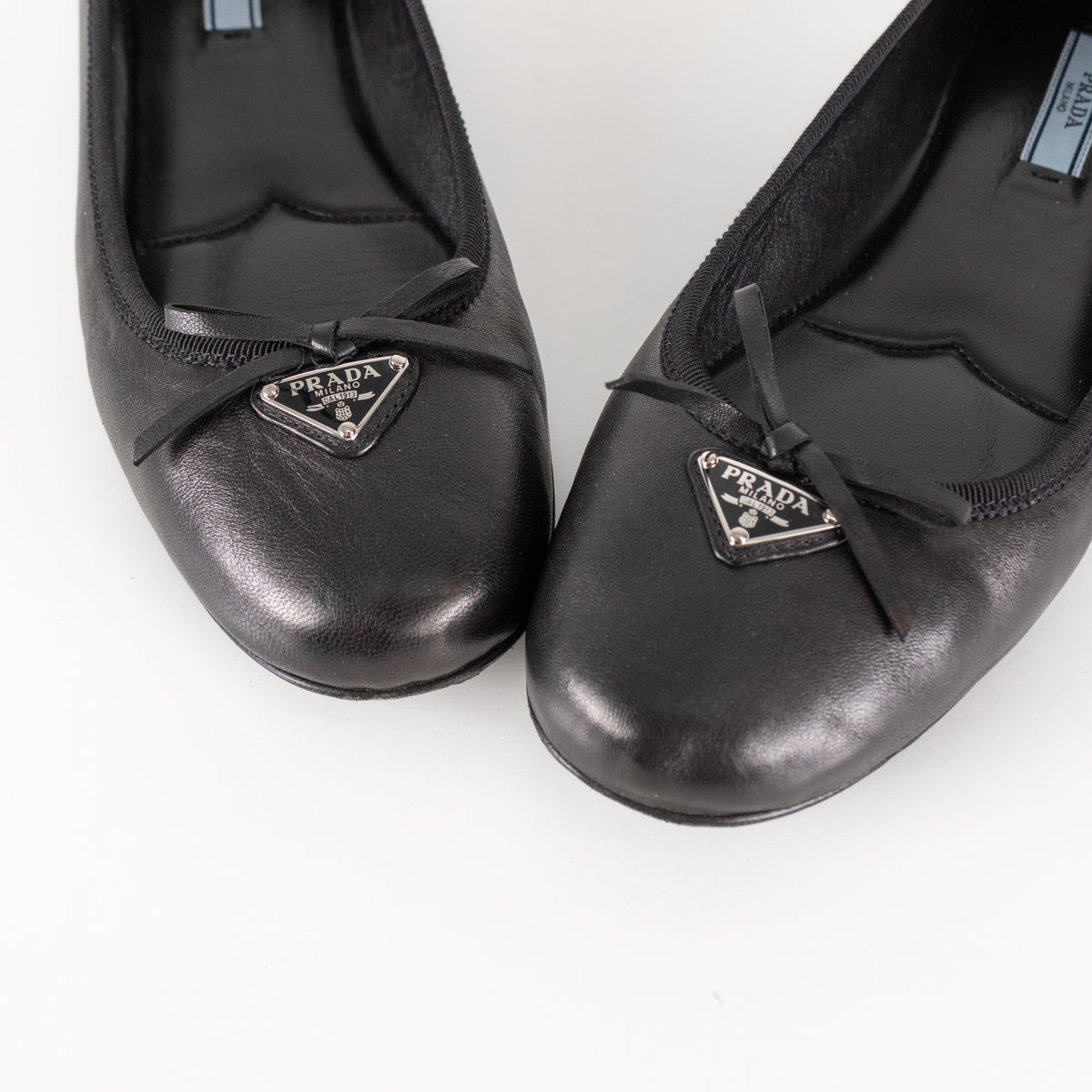 Prada Black Leather Ballet Flats With Bow And Logo Plaque
