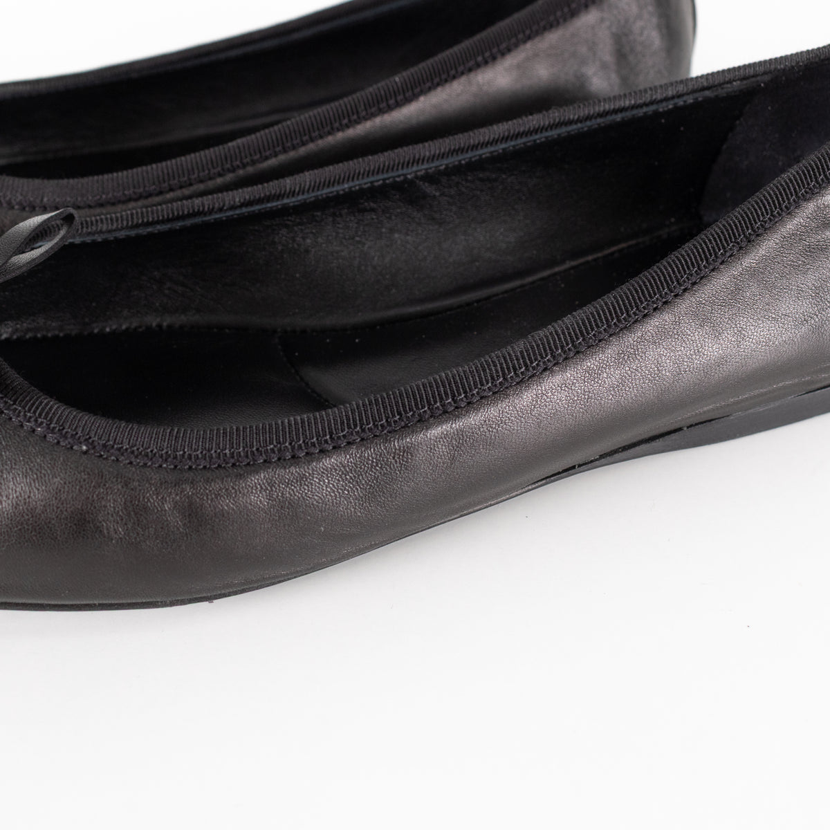 Prada Black Leather Ballet Flats With Bow And Logo Plaque