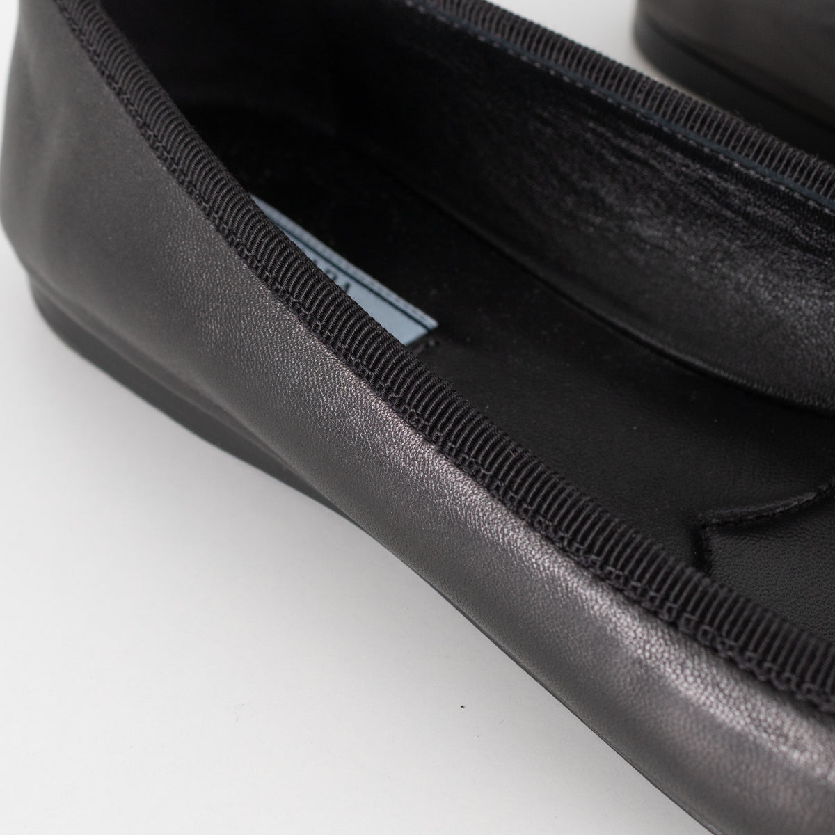Prada Black Leather Ballet Flats With Bow And Logo Plaque