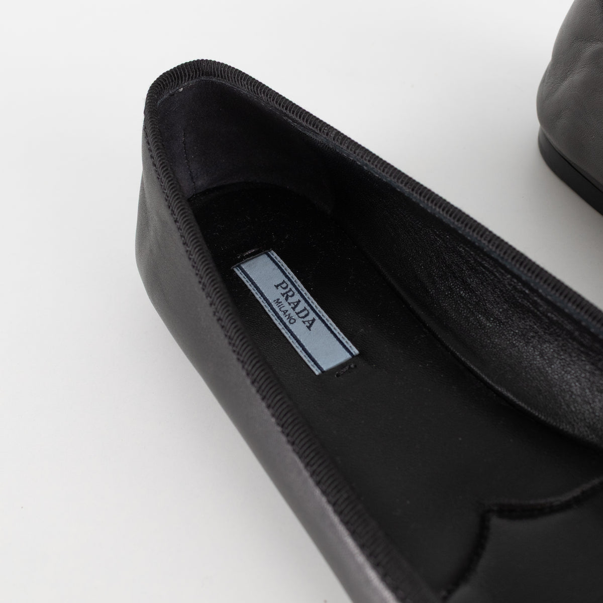 Prada Black Leather Ballet Flats With Bow And Logo Plaque