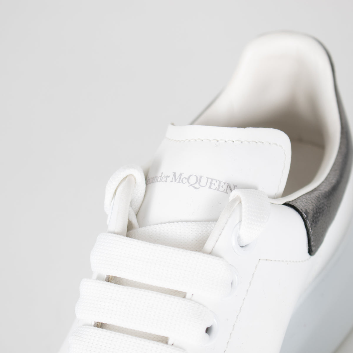 Alexander McQueen White Leather Trainers with Gunmetal Heel Tab