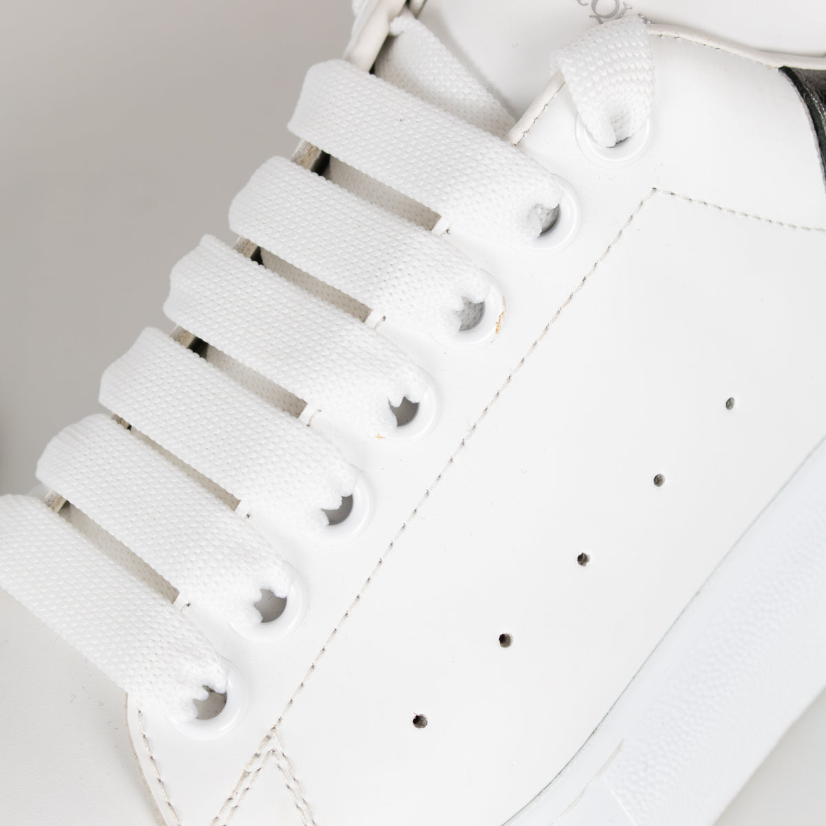 Alexander McQueen White Leather Trainers with Gunmetal Heel Tab