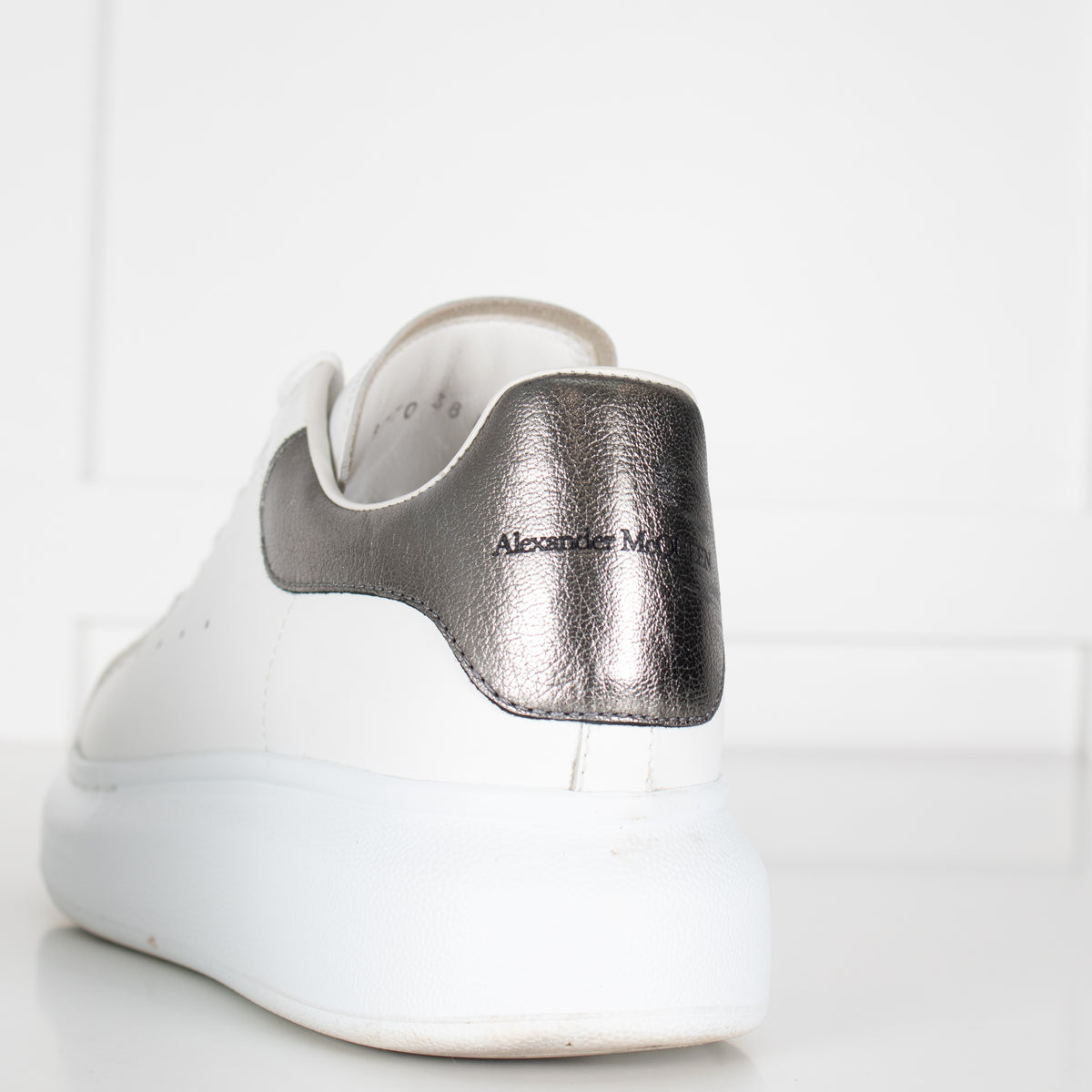 Alexander McQueen White Leather Trainers with Gunmetal Heel Tab