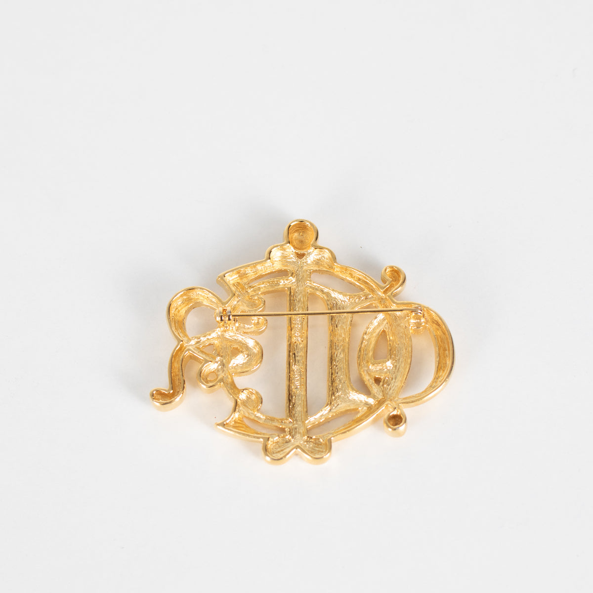 Christian Dior Gold Tone Monogram Brooch