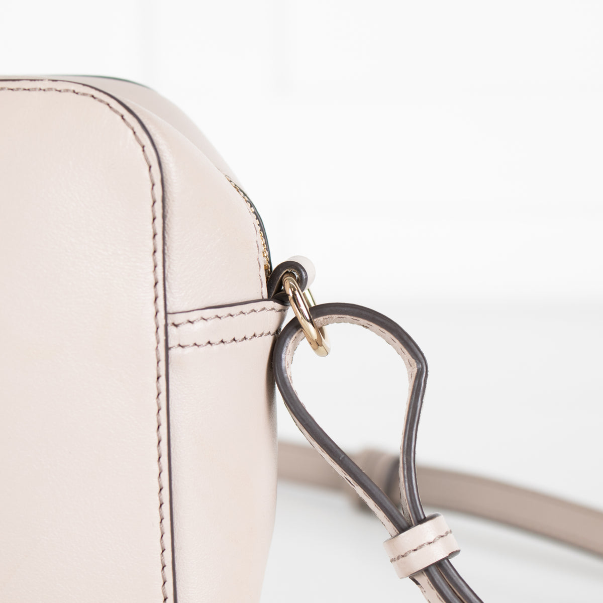 Anya Hindmarch Taupe Perforated Smiley Face Crossbody Bag