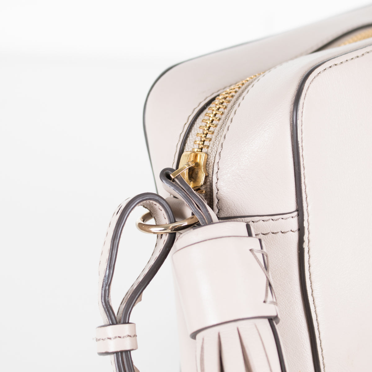 Anya Hindmarch Taupe Perforated Smiley Face Crossbody Bag