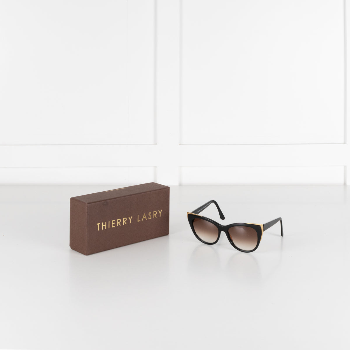Thierry Lasry Black Cat Eye Sunglasses With Gold Accent