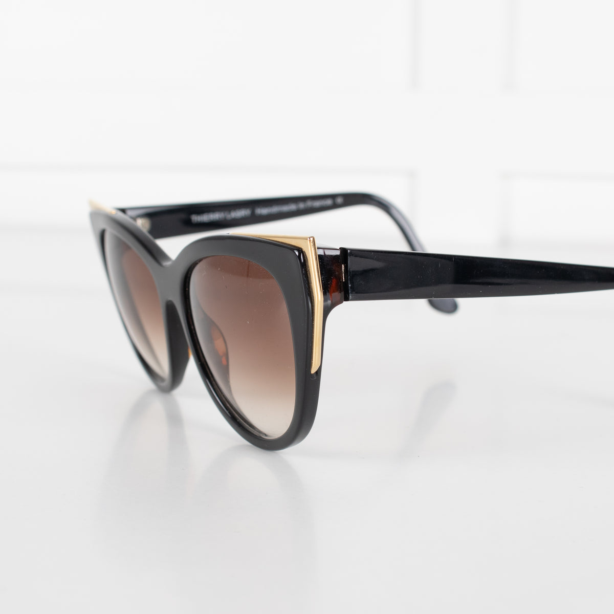 Thierry Lasry Black Cat Eye Sunglasses With Gold Accent