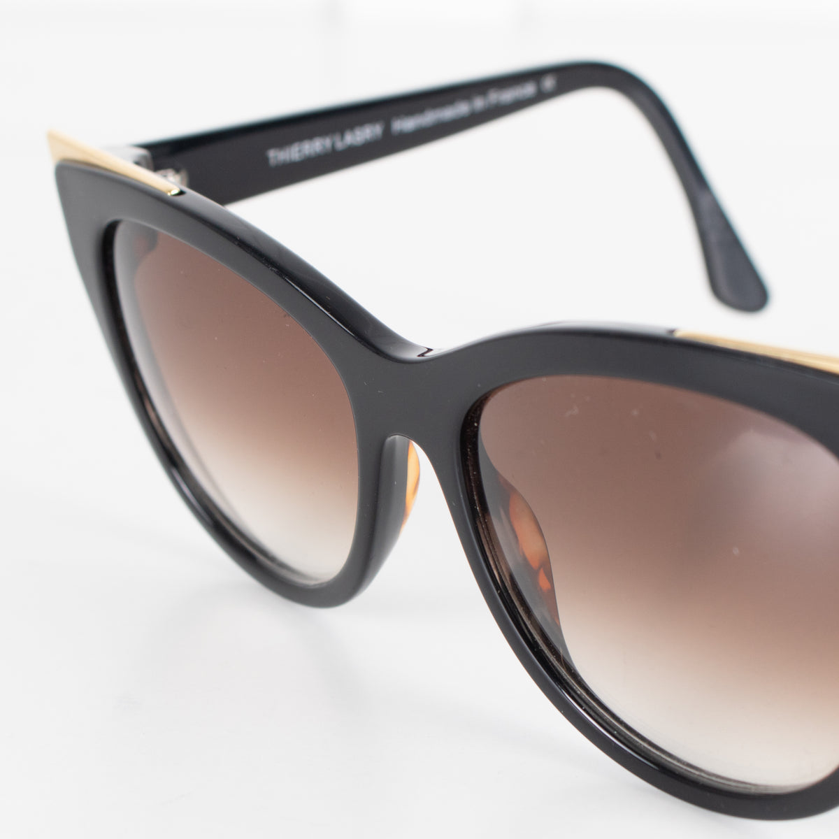 Thierry Lasry Black Cat Eye Sunglasses With Gold Accent