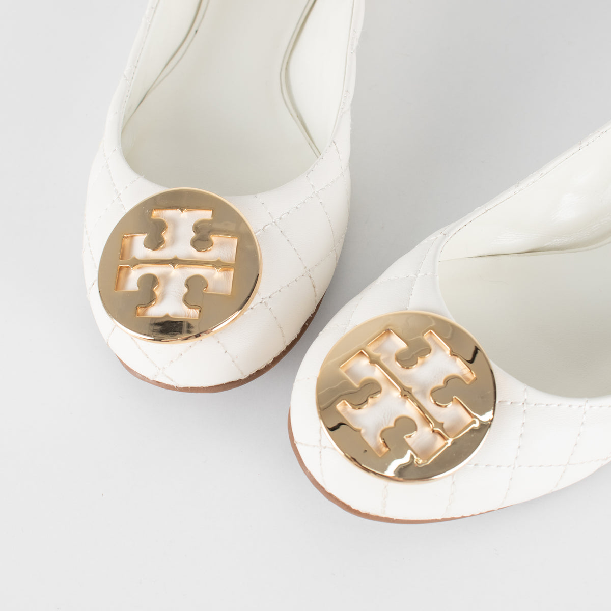 Tory Burch White Quilted Leather & Gold Medallion Pumps