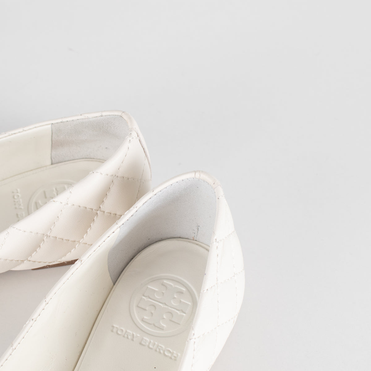 Tory Burch White Quilted Leather & Gold Medallion Pumps