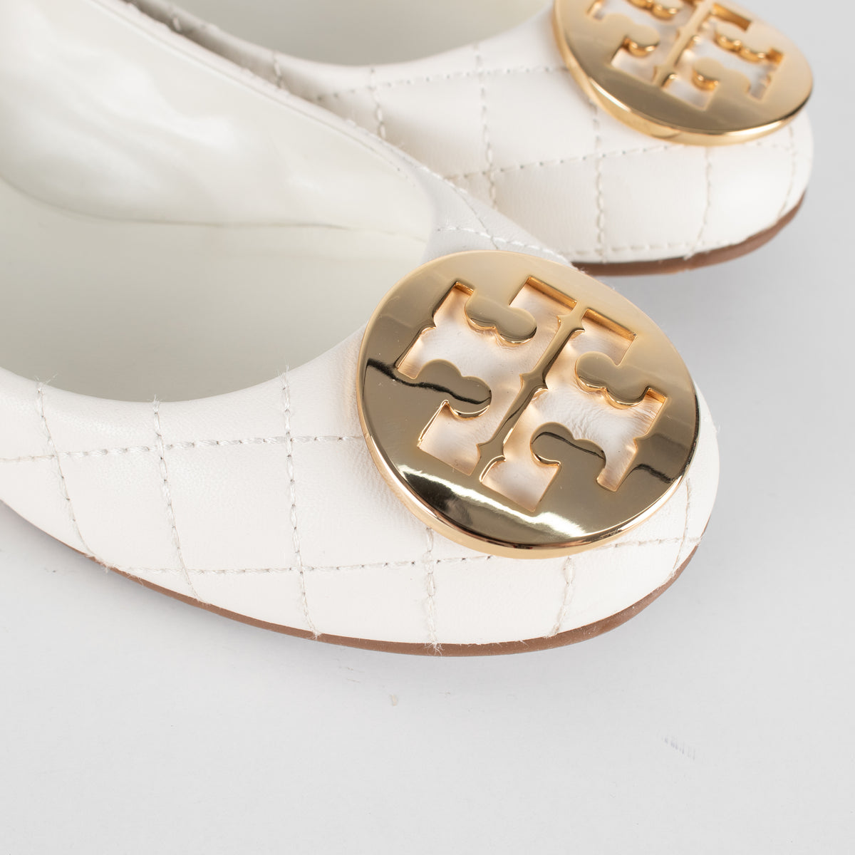 Tory Burch White Quilted Leather & Gold Medallion Pumps