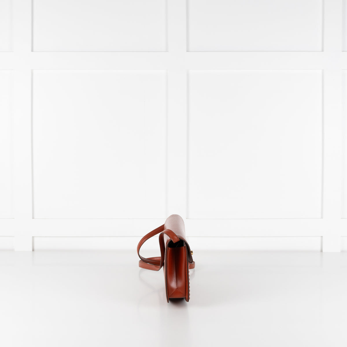 Side image of Louis Vuitton pre loved bag.