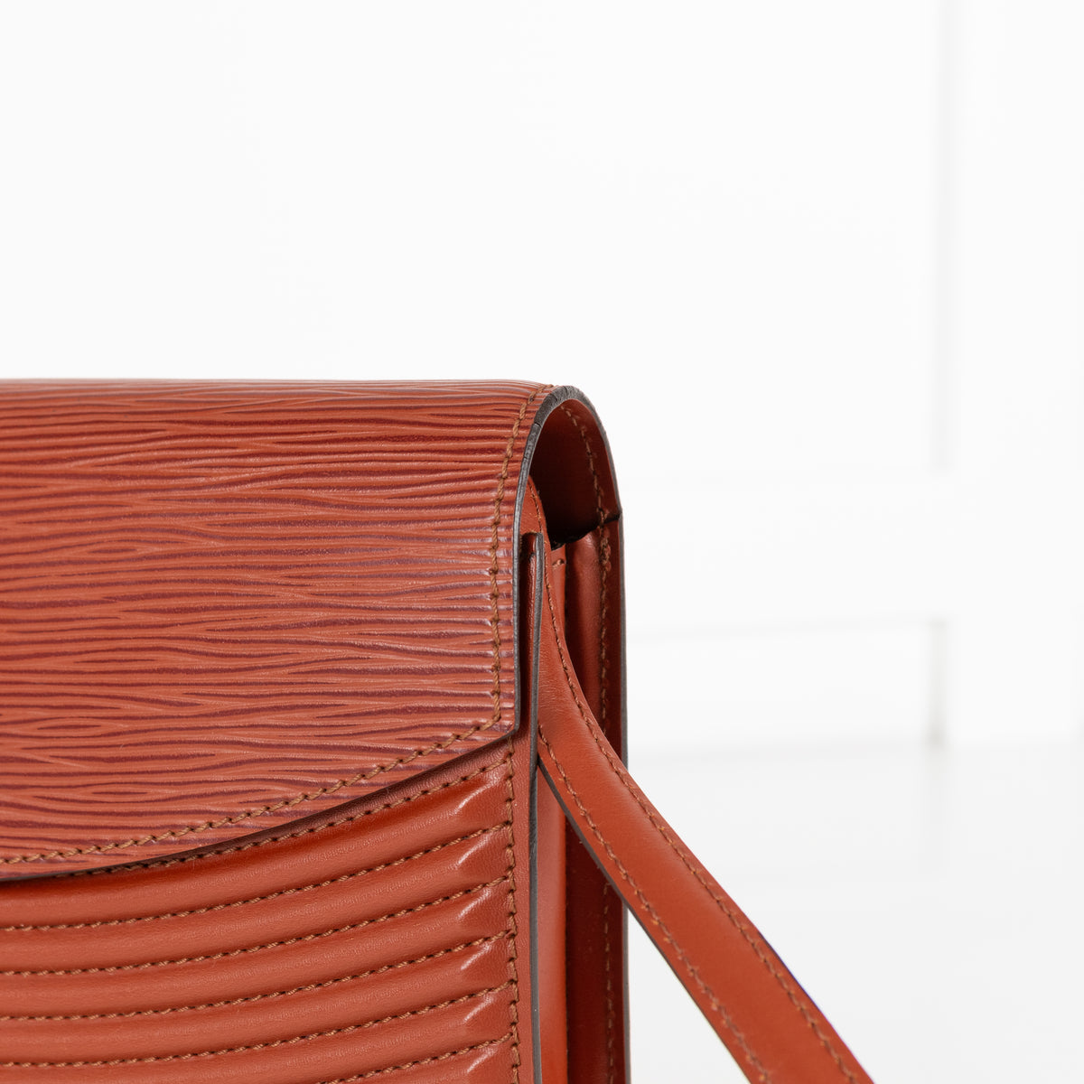Close up of detailed leather Louis Vuitton Vintage Epi Prebourg Kenya Brown 36 bag.