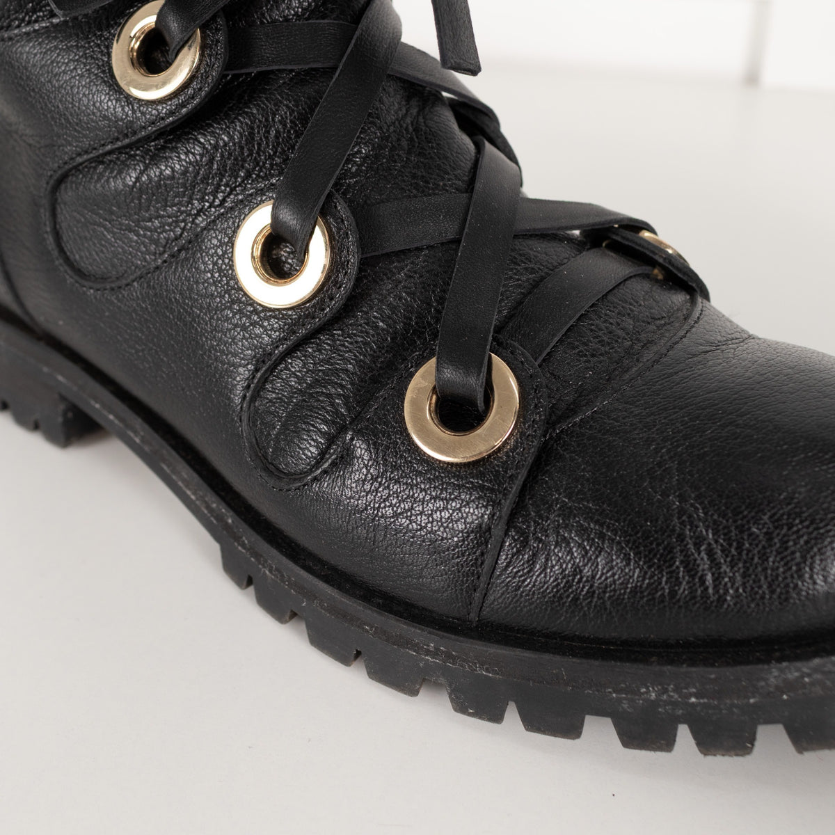 Jimmy Choo Black Leather Ankle Boots with Gold Eyelets - Image 9